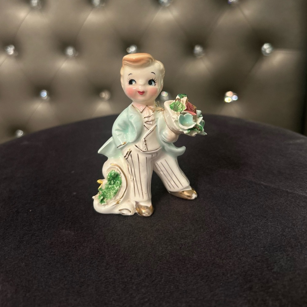 Charming Ceramic Boy Figurine with Green Details